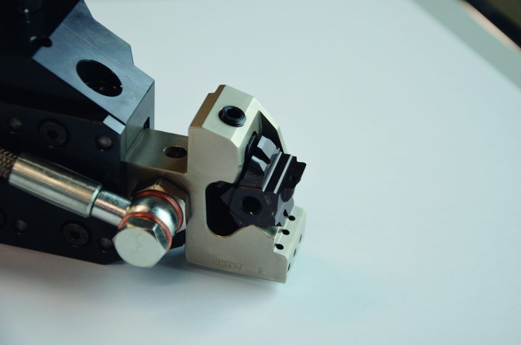 Hawe Hydraulik optimierte entscheidend seine Bearbeitungsprozesse mit der Sonderstechplatte Penta  Cut 27 
von Iscar.